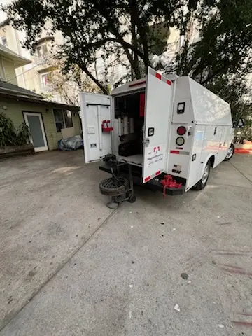Magnet Plumbing service vehicle on-site for Water Heater Repair in The Jungle