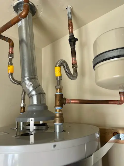 Water heater installation and plumbing repair in The Jungle